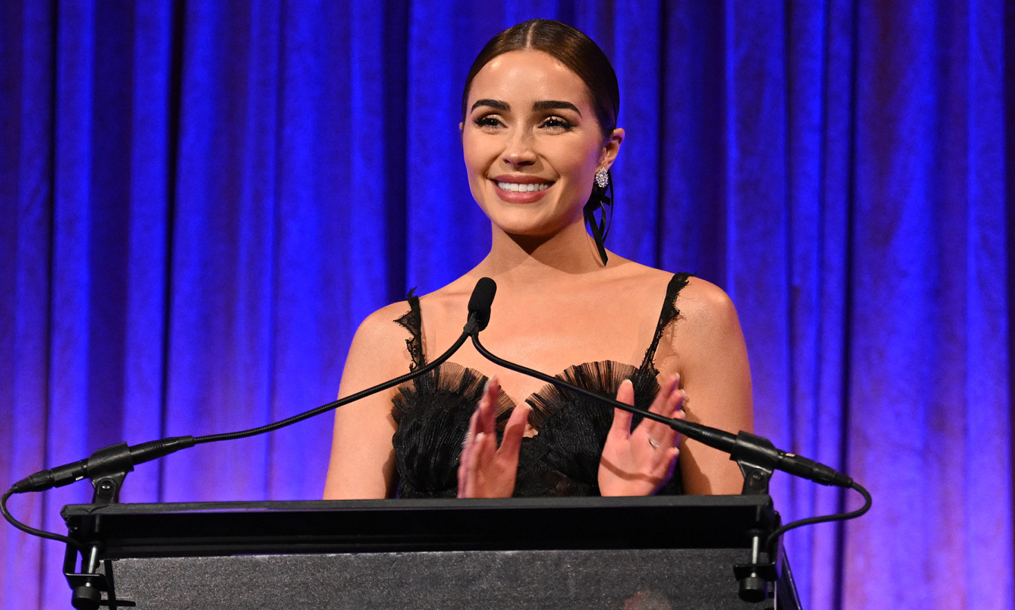 Olivia Culpo speaks at the 11th Annual Blossom Ball of the Endometriosis Foundation of America, for which she is an ambassador, on March 20, 2023. 