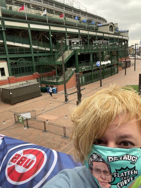 Dr. Shannon Zenk wearing a face mask outside Wrigley Field.