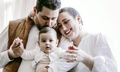 Ashli Brown with her husband and daughter.  