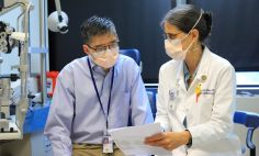 NEI Director Dr. Michael Chiang and Dr. M. Teresa Magone, chief of the NEI Consult Clinic.