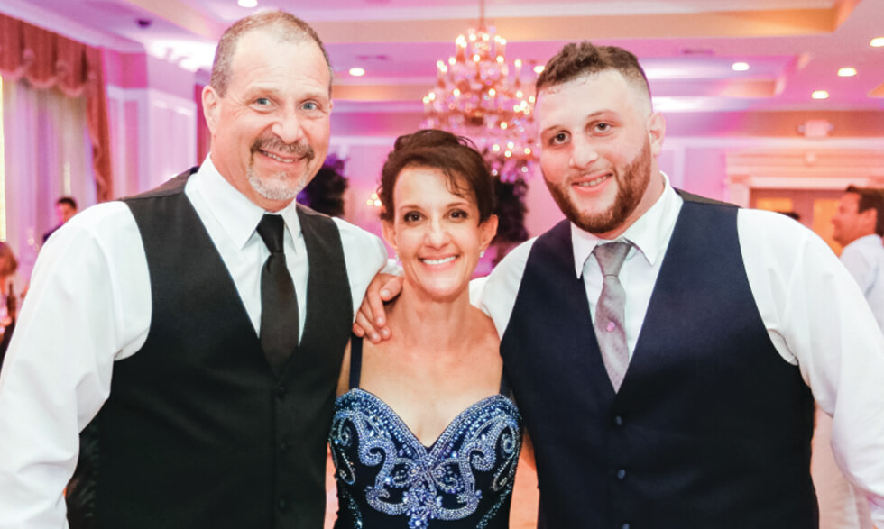 Anthony Terlizzi, right, pictured with his parents in 2016. 