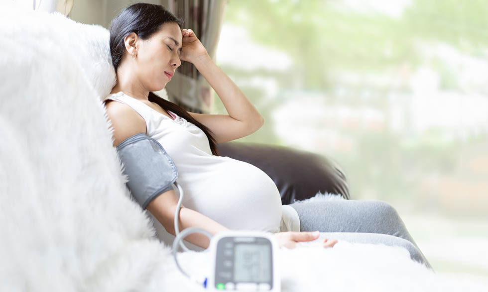 Researchers are working to understand what causes preeclampsia, a condition whose symptoms include high blood pressure. 